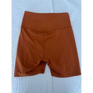Girlfriend Collective Stretch Biker Shorts in Burnt Orange